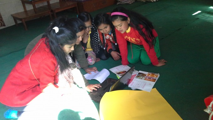 Group 2 working on their calendar story about Friendship