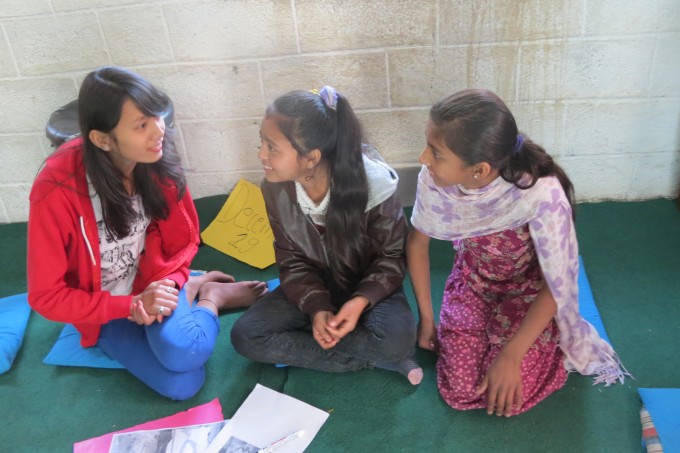 Group three trying to understand the pictures they selected