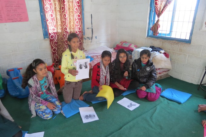 Nirupa explaining about women violence through the picture she chose