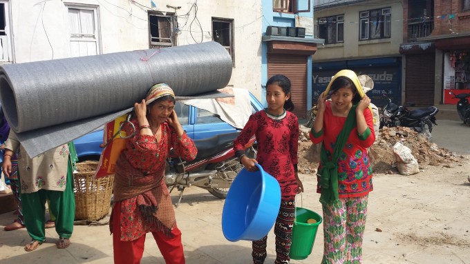 Sunita KC (center) with her Mother (left) and her elder sister (right)