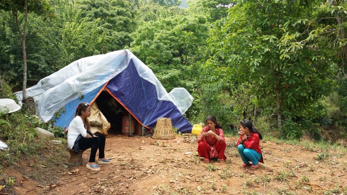 Rukmini Didi Pramila (left) inspects Sunita and her Mother's current living condition