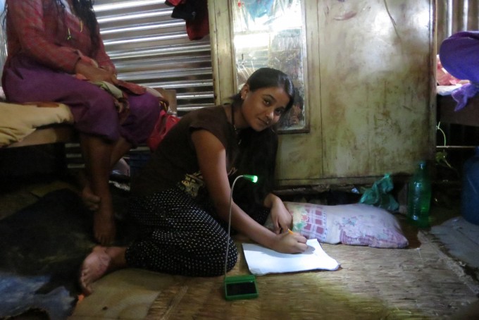 Anjana poudel with solar lamp (1)