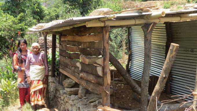 14 sabina and grandma of Saraswoti infront of their temp shed