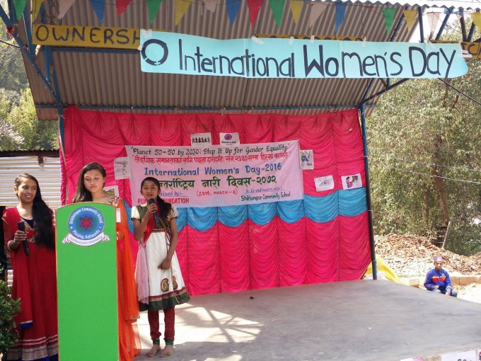 Students perform speeches and share stories to the audience. 