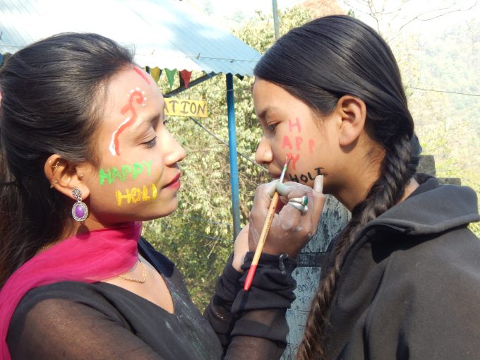 Didi Pramila paints Bahini Sadikshya KC's face
