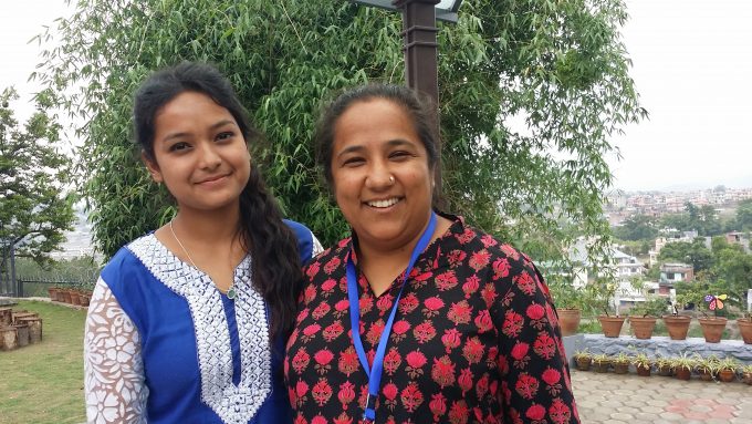 Ruku Graduate Scholar Sushmita takes the opportunity to take a photo with Puspa Didi
