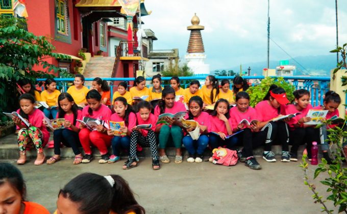 Girls are into their book during independent reading session 2nd day