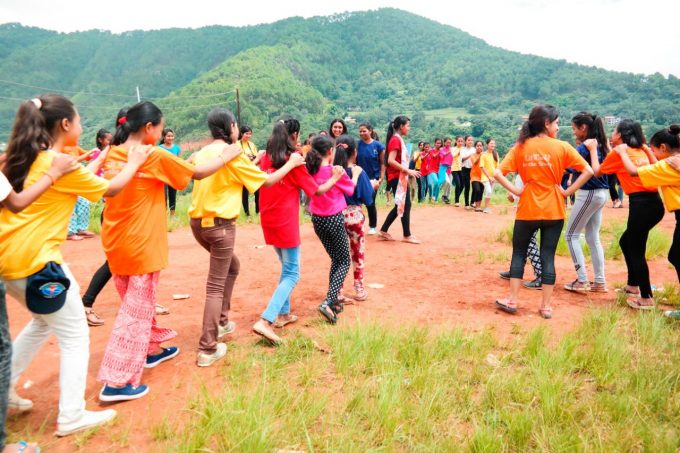 Girls join game named _Help you friend get the ball_ on 2nd day of Litcamp