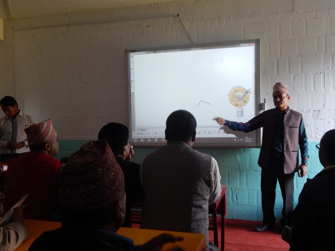 program-officer-niroj-explains-the-features-of-smart-board