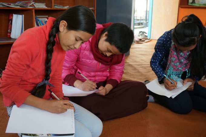 Sadikshya K.C and Tsultrim -doing group work