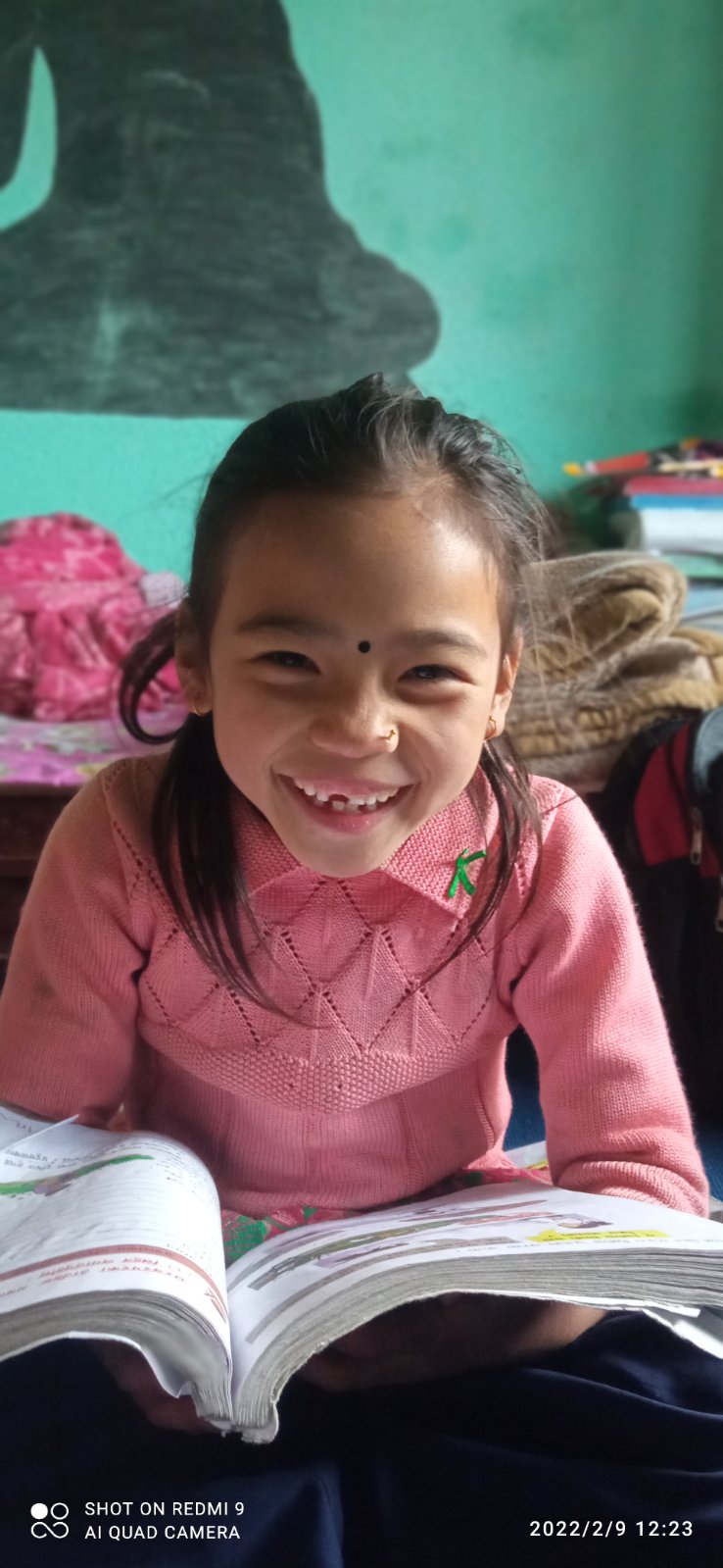 Bahinis smiling with a reason that she learn new things