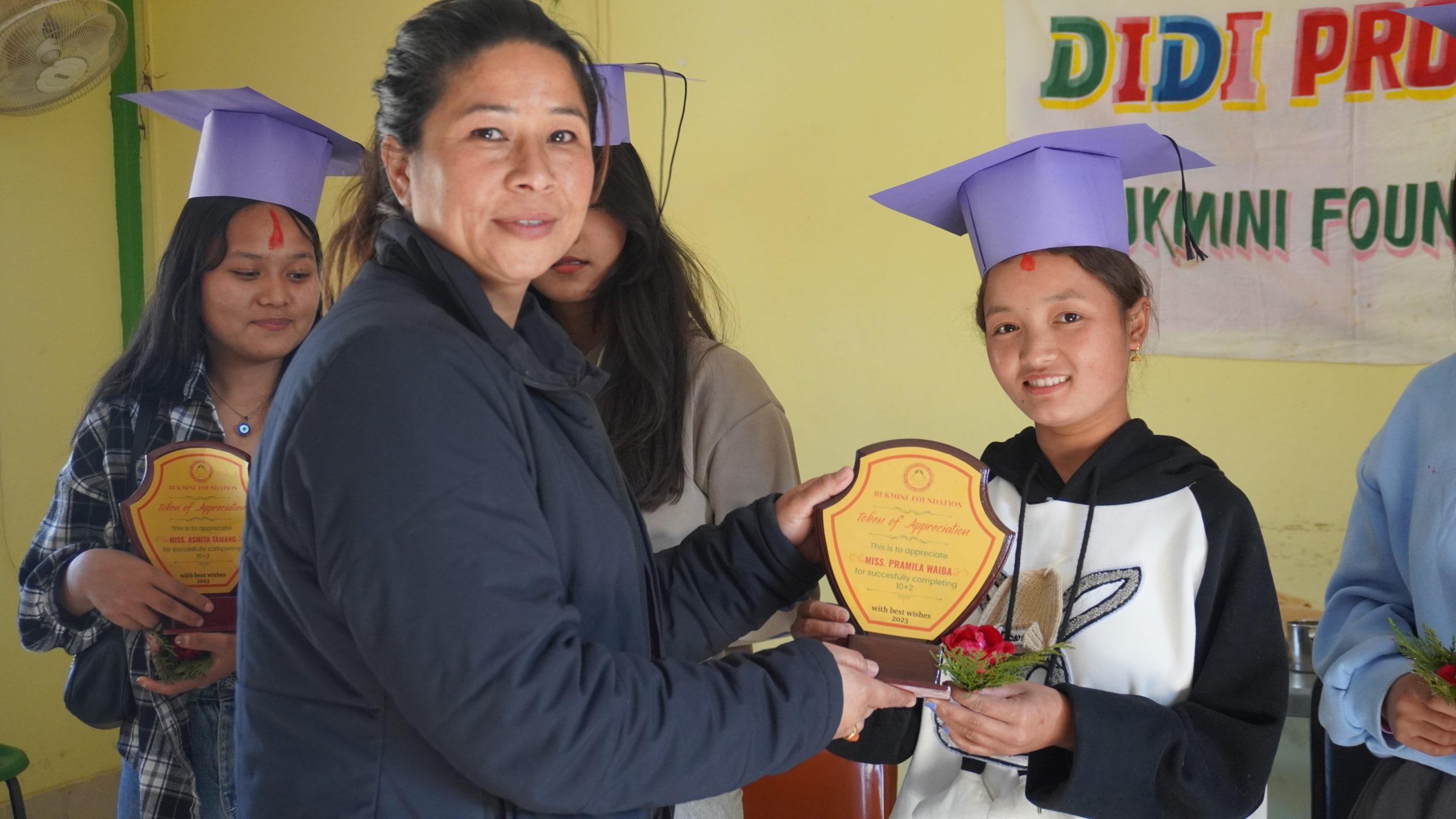 DIDI Sanju Maharjan gives token of love for RF bahini Pramila Waiba.