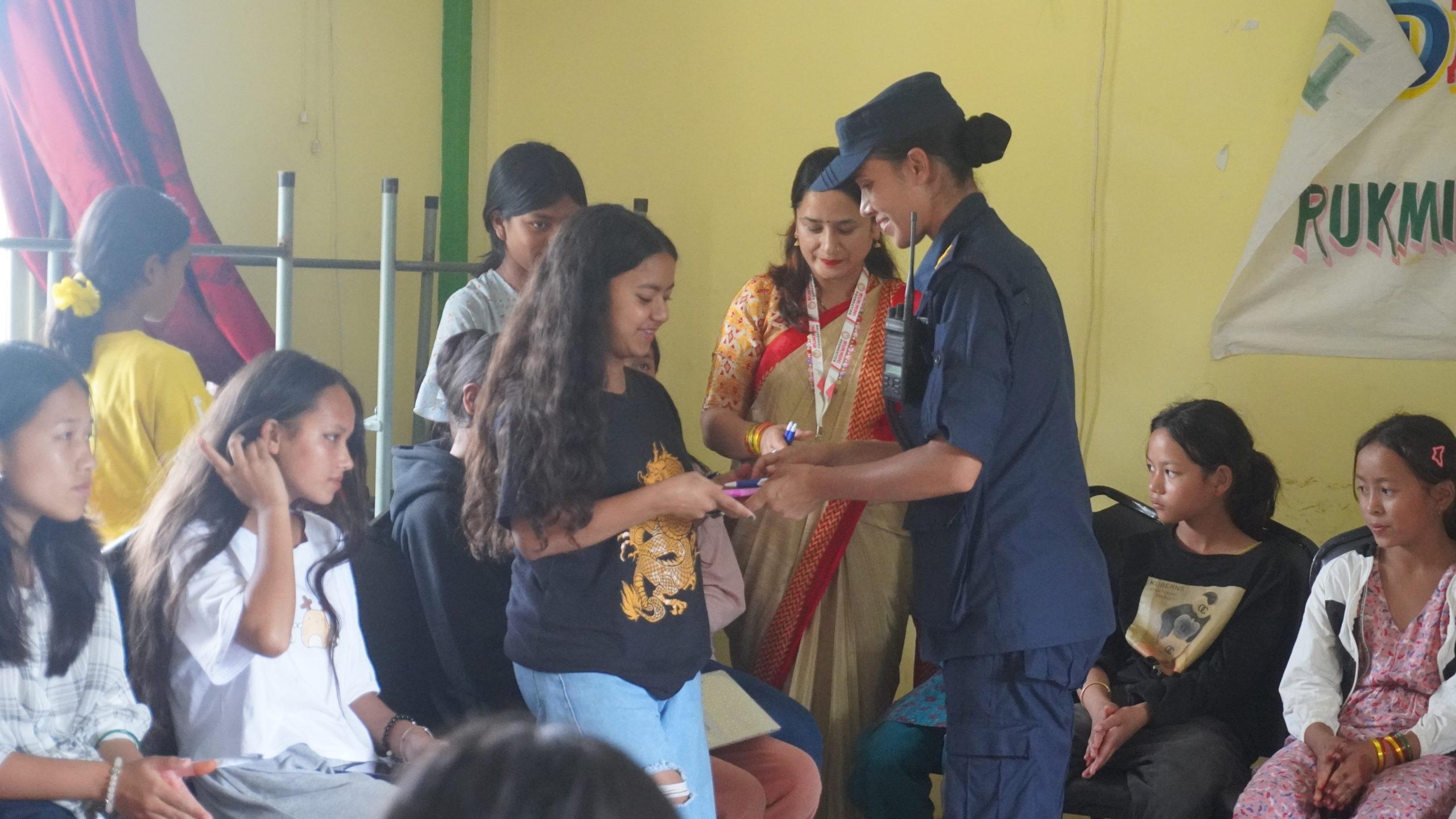 Gyanmanjari didi distributing diary and pen to bahinis who recently passed the SEE examination