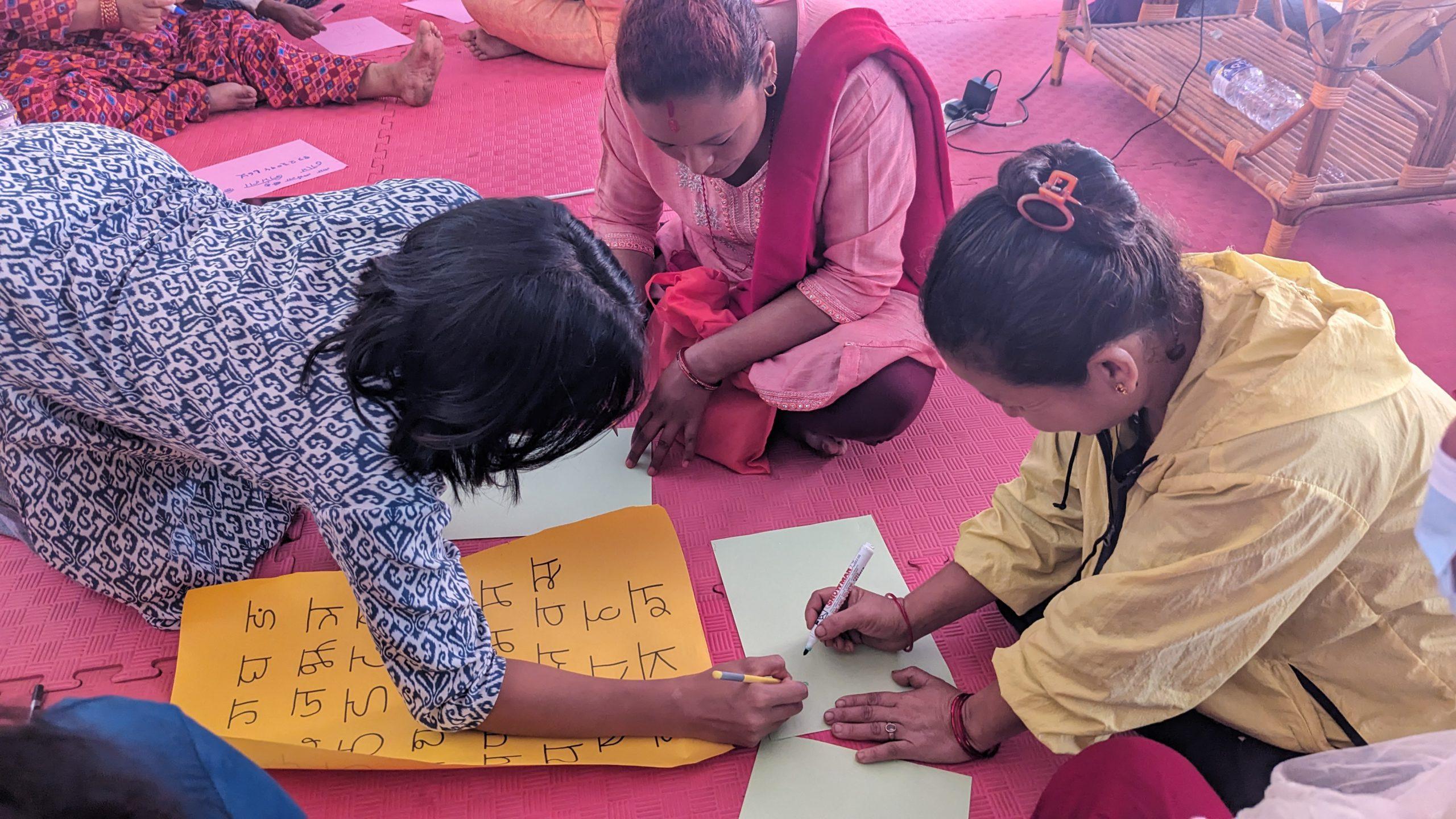 SWCT member helping to parents write name