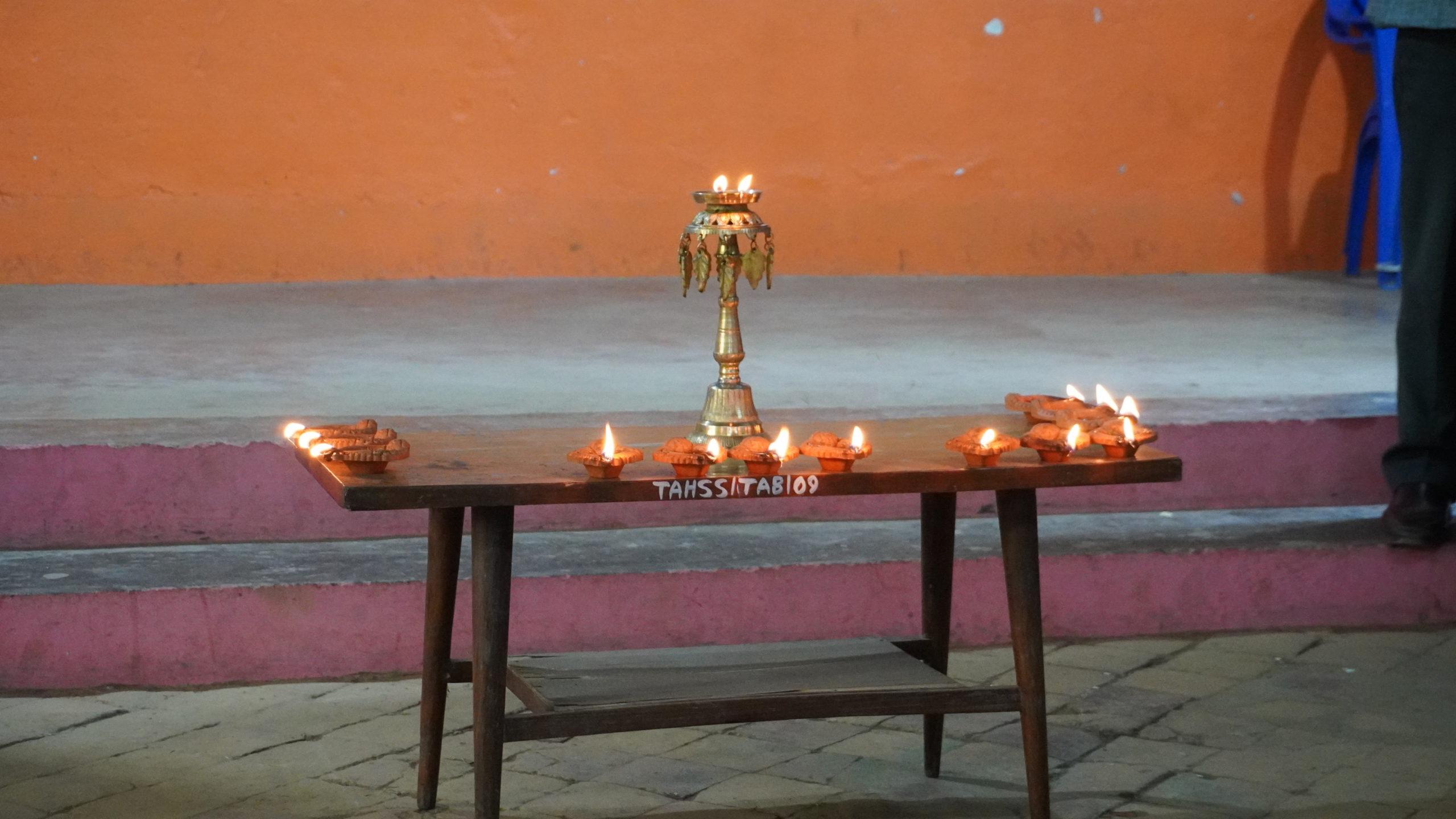 Lighting 13 Diyo (traditional oil lamp)by bahinis for 13 years of empowerment