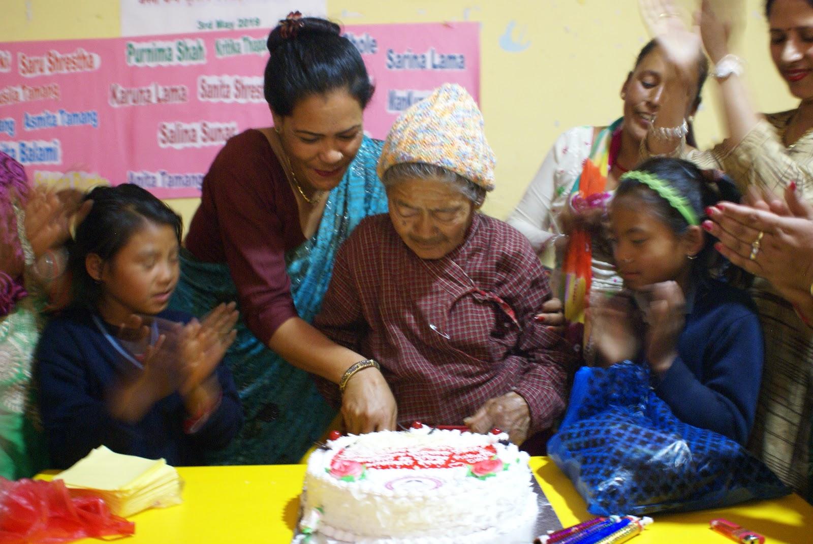 Cake cutting from Aama