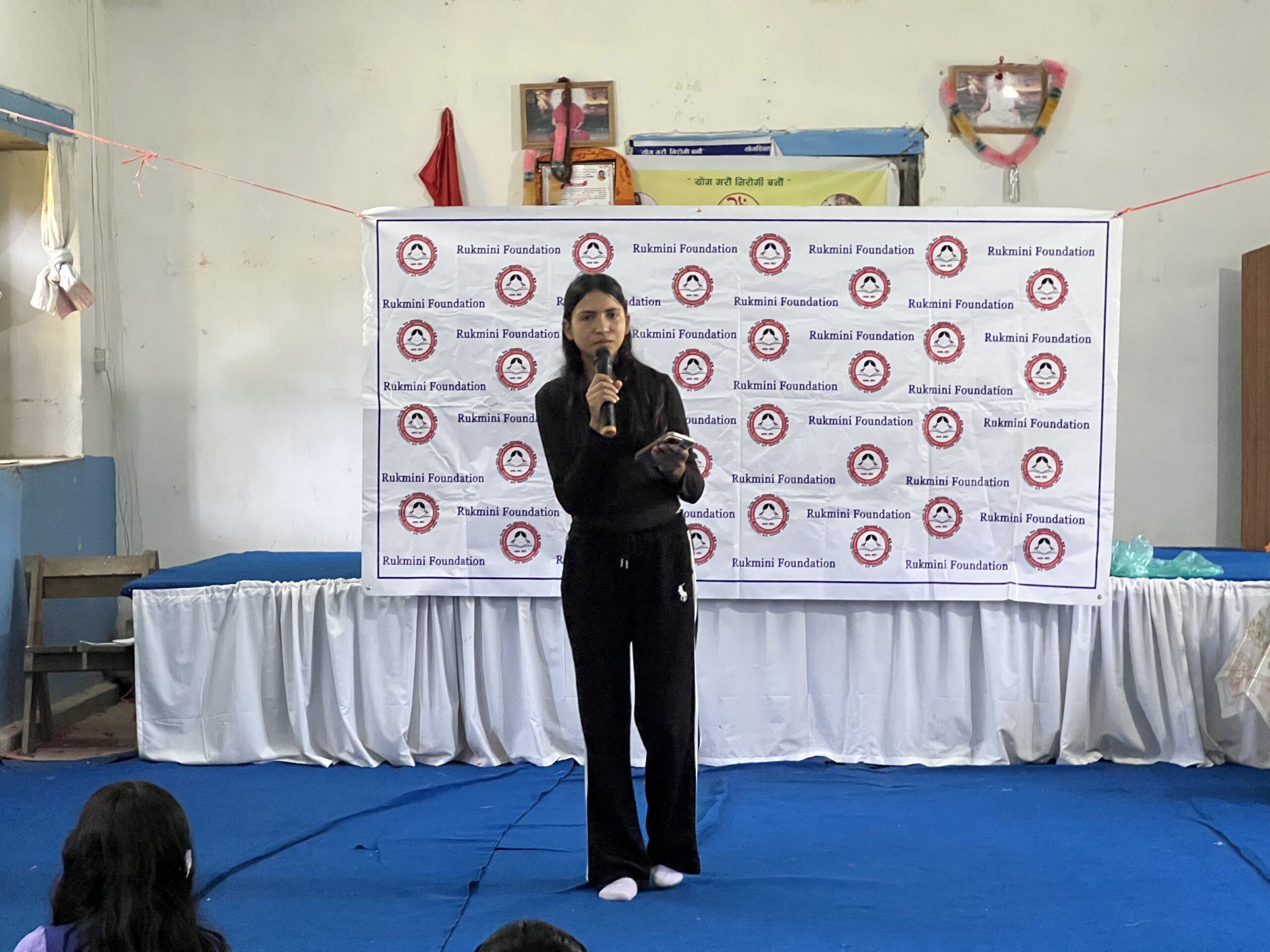 Radhika Bahini singing a song during Anniversary Celebration program of Rukmini Foundation_