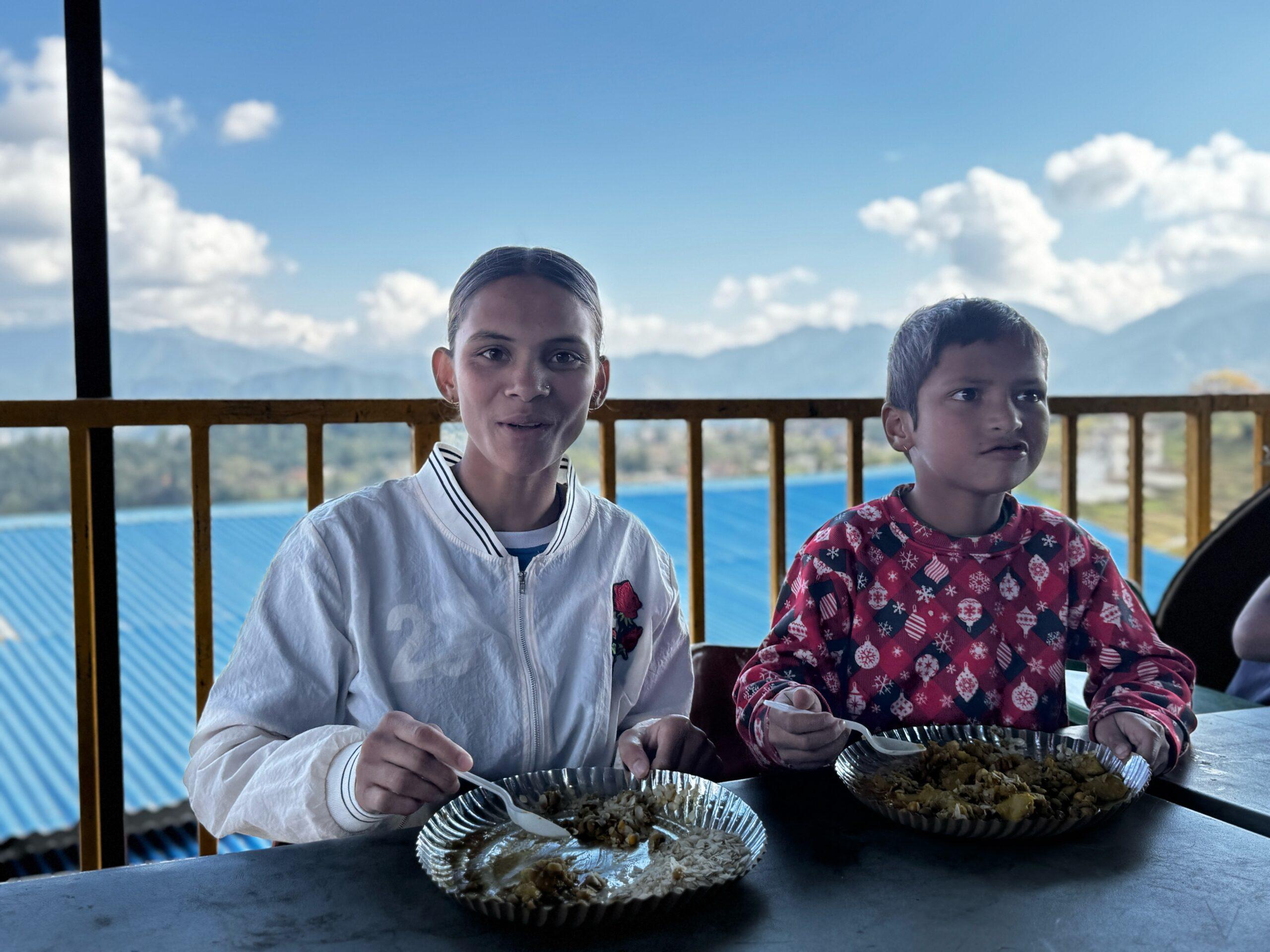 Bahini Sunita enjoying lunch with her younger brother