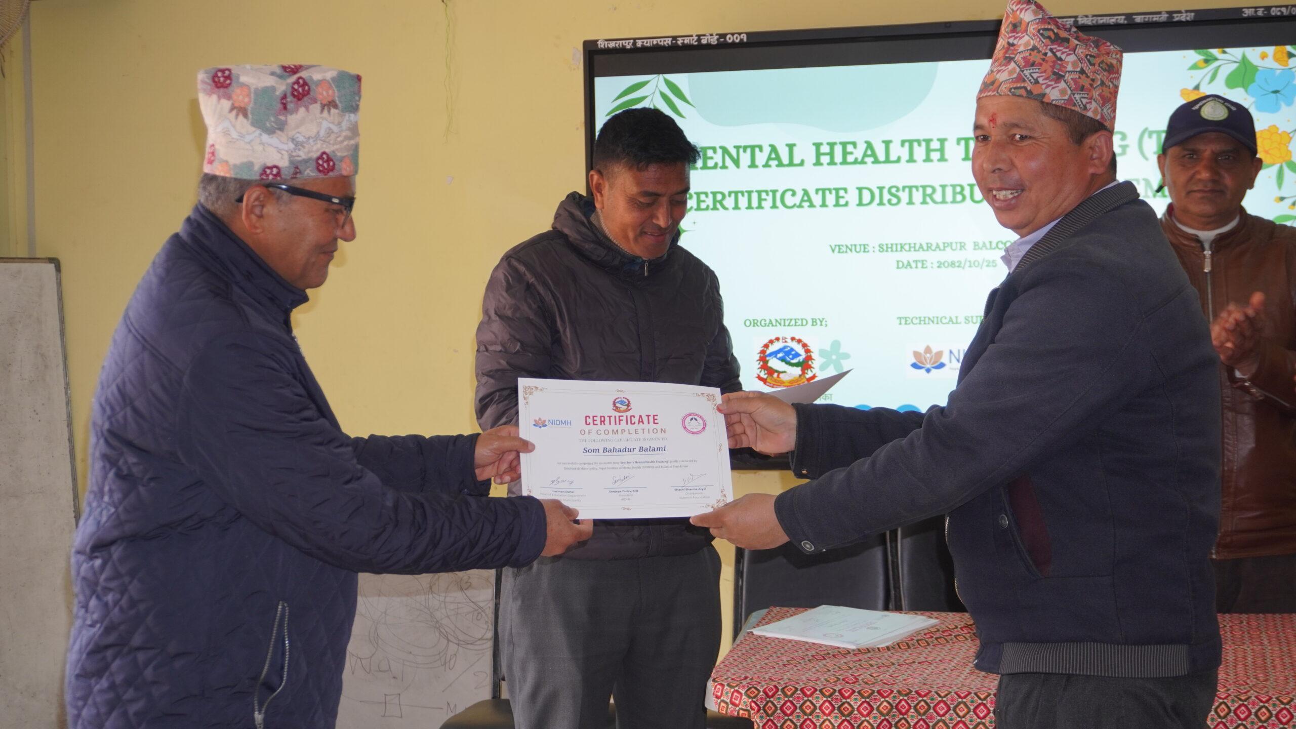 Certificate Distribution to Som (Teacher of Setidevi,Talku) by Laxam (Section Officer of Education,Youth and Sports Section)