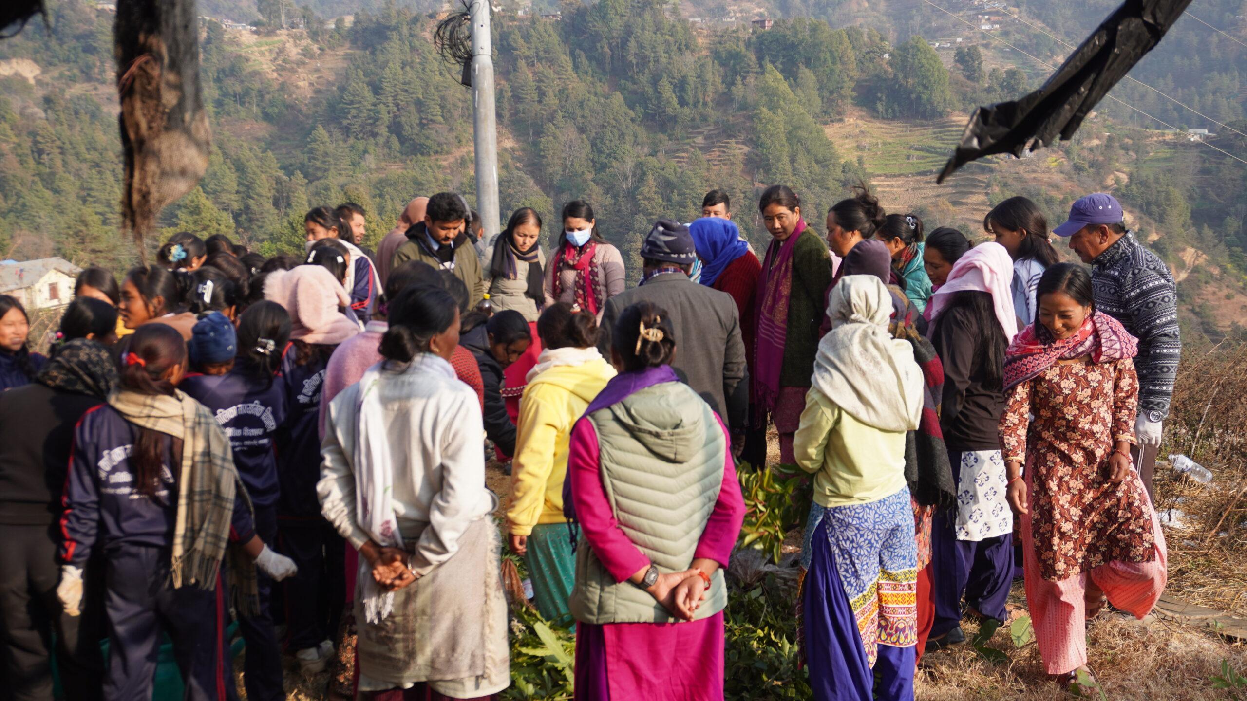 Everyone is working together collaboratively to prepare the compost fertilizer_