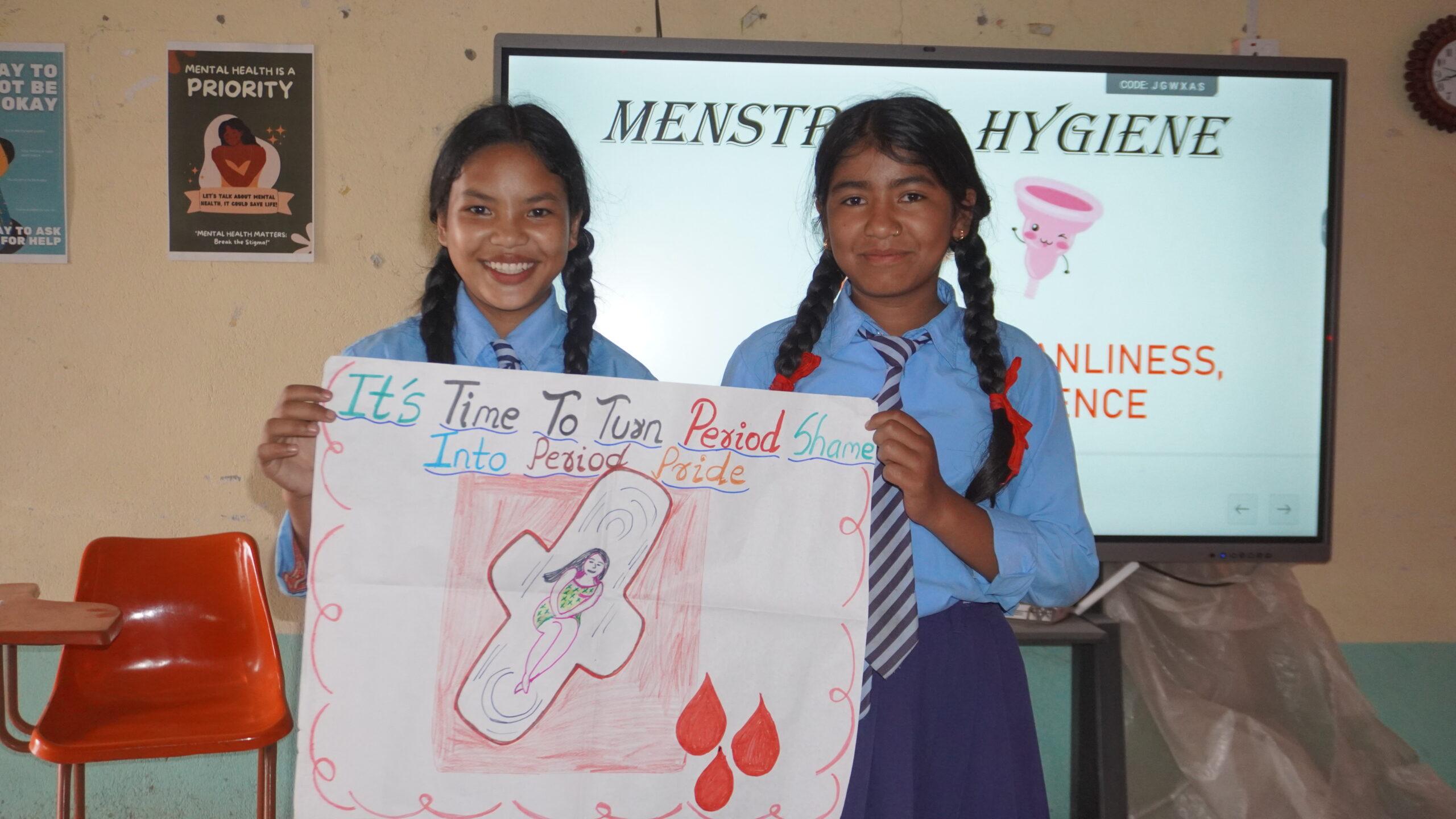 Girls holding banners together after the awareness session_