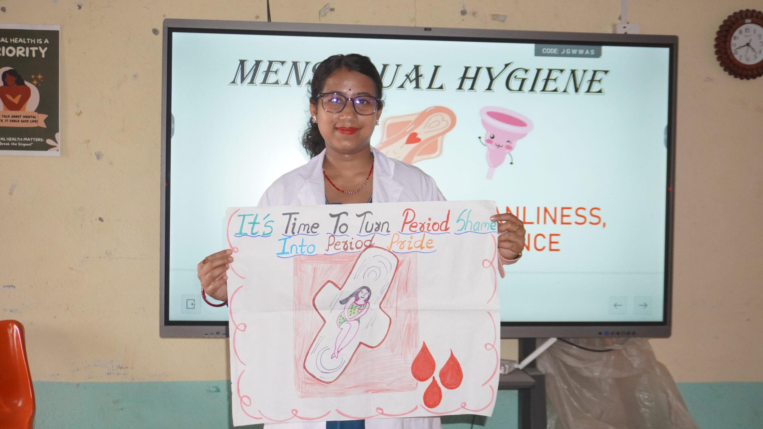 “Resource Person Kanchan posing with the program banner_