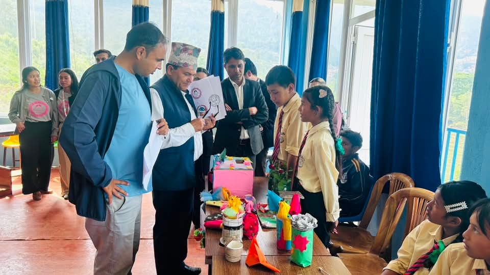 A student from Shree Krishna School explaining the items displayed at the stall