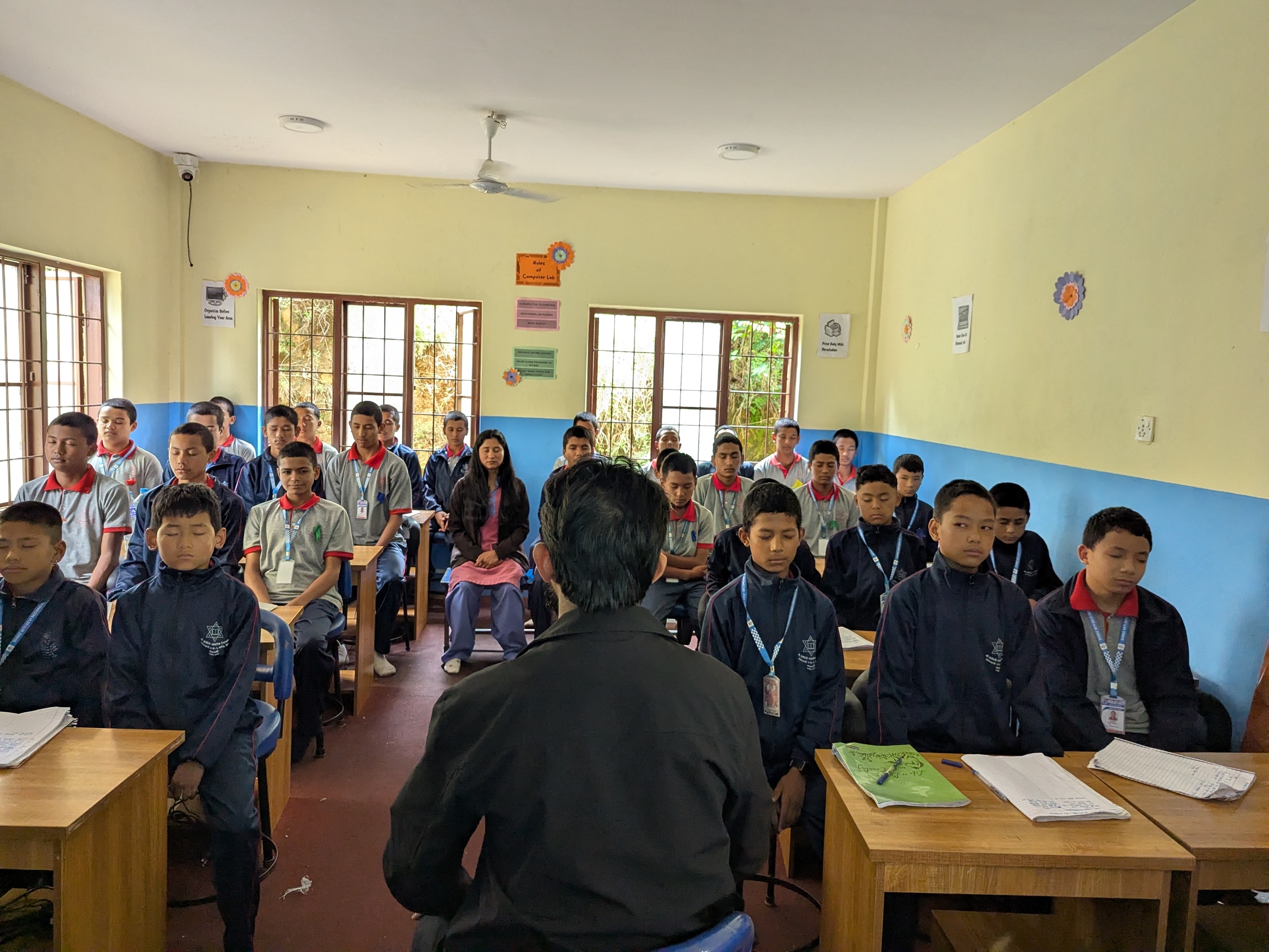 Kapil Sir teaching students deep breathing techniques_