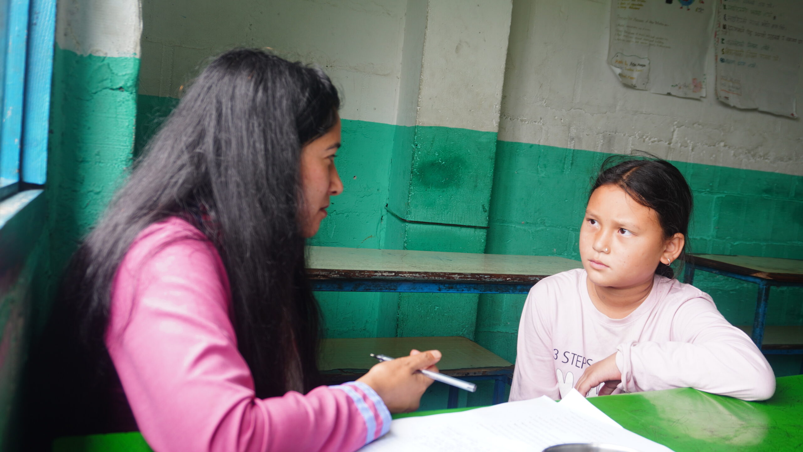 Sabina Didi talking with Divyanshi Bahini during the individual Didi mentoring session.
